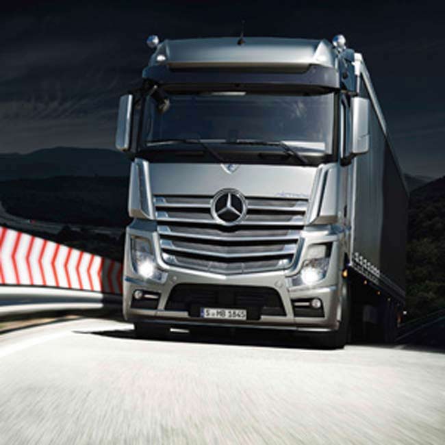 Mercedes-Benz truck driving at night - Diesel Mechanic Central Coast, NSW
